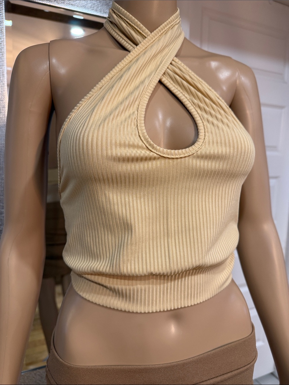 Sleeveless Ribbed Halter Crop Top in Cream